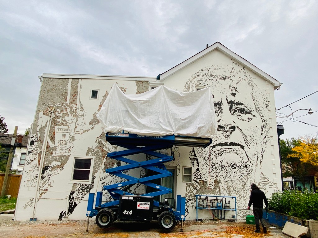 Collaboration with Vhils in mural honouring Cleaners’&nbsp;Action